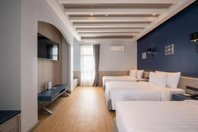 Camera Deluxe tripla — Seabed Grand Hotel Phuket